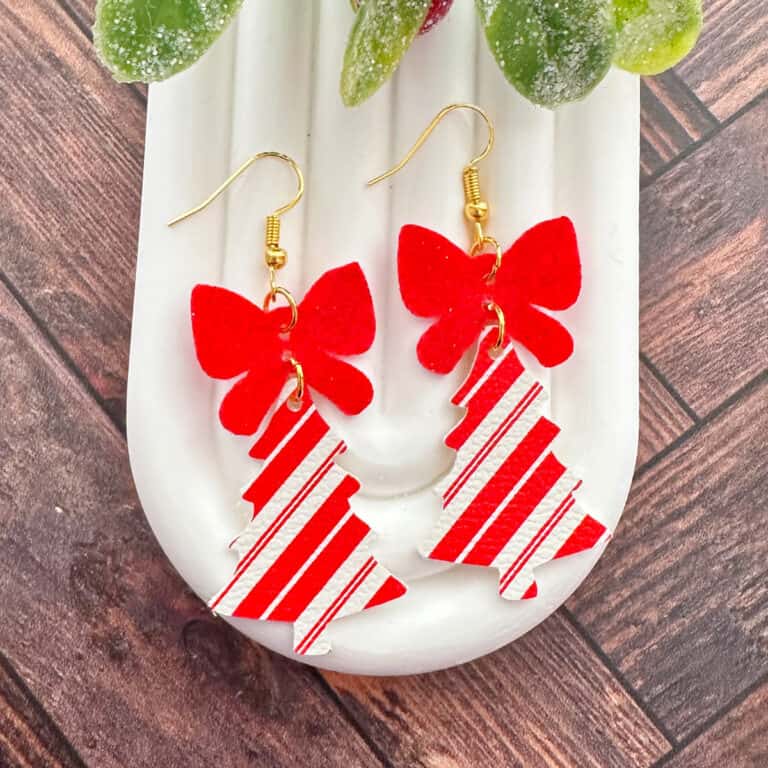 faux leather holiday bow earrings