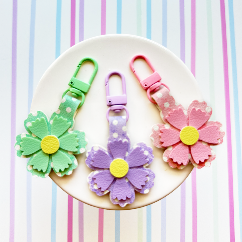 faux leather mini flower keychains made with a Cricut