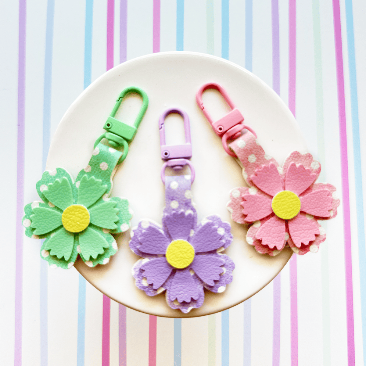 faux leather mini flower keychains made with a Cricut