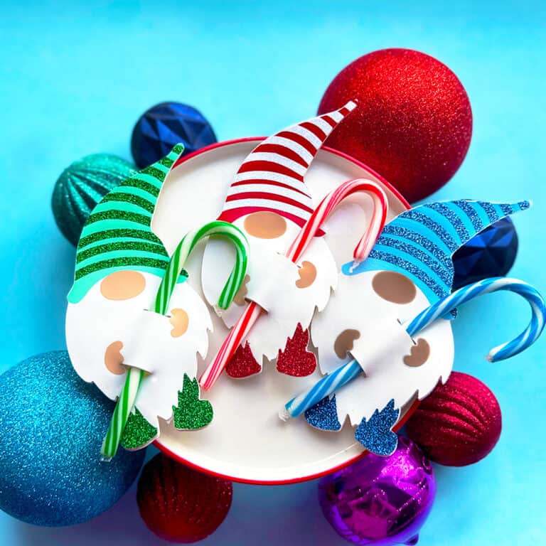 faux leather gnome candy cane holders made with a Cricut