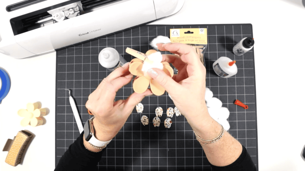 gluing faux leather petals to flower hair claw clip