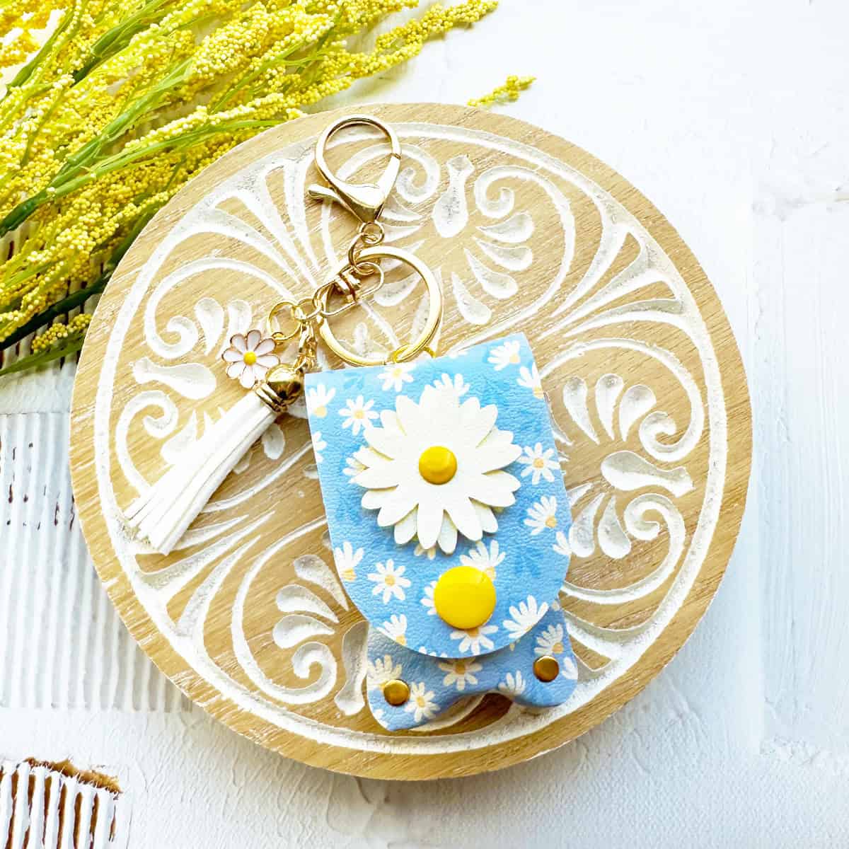 Faux Leather Daisy Lip Balm Holder made with a Cricut