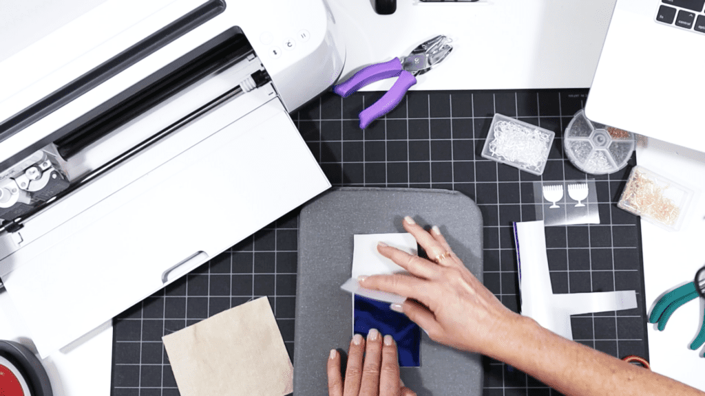 pressing foil iron on to the back of faux leather