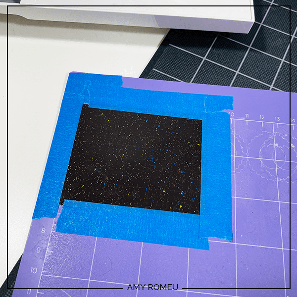 taped down jelly sheet to purple Cricut mat