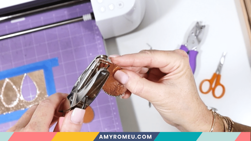 using hole punch to make earring holes