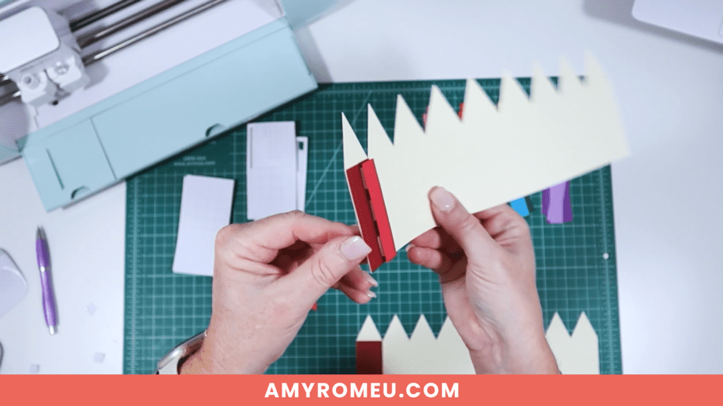 adhesive foam squares adding dimension to layered paper craft