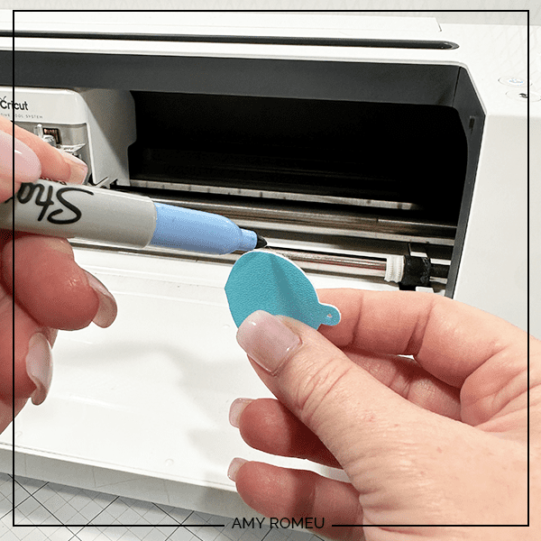 coloring faux leather earring edges with a Sharpie