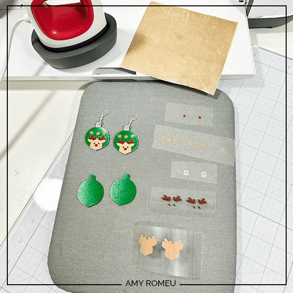 vinyl layers to press onto faux leather to make reindeer ornament earrings with a Cricut