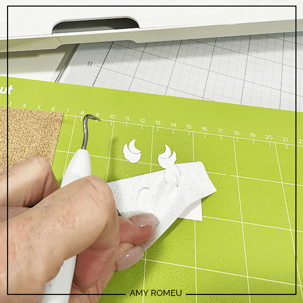 weeding vinyl for faux leather arched angel earrings with a Cricut