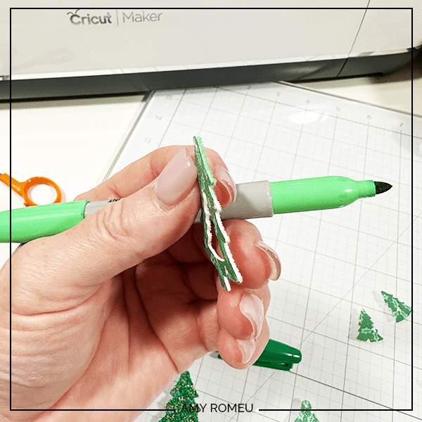 coloring edges of Cricut faux leather Christmas Tree earrings