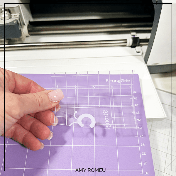 protecting Cricut purple mat from chunky glitter vinyl with transfer tape