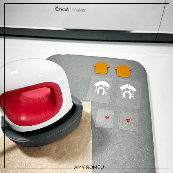 prepping to heat press vinyl layers for Faux Leather Gingerbread Cookie Earrings made with a Cricut