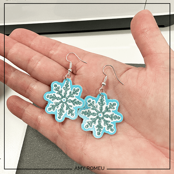 finished faux leather snowflake earrings made with a Cricut