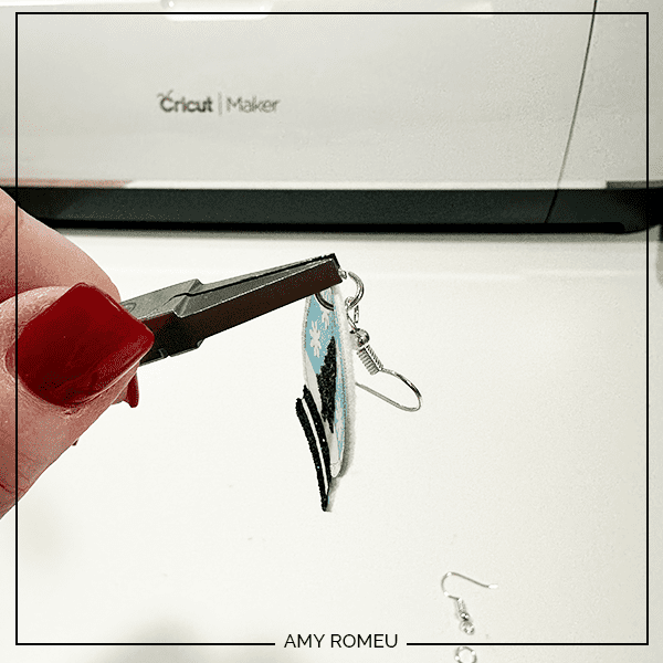 attaching earring hooks to to make faux leather snow globe earrings with Cricut