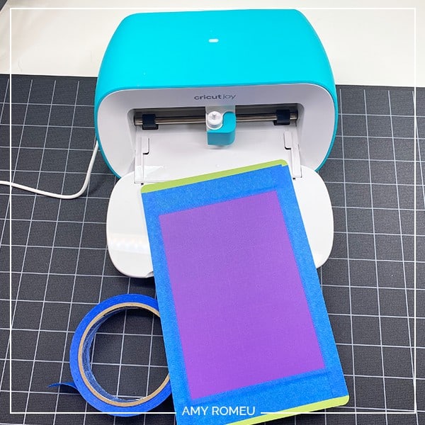 tape plastic to cricut joy mat for ear saver tutorial