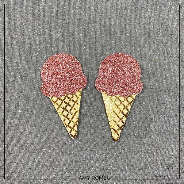 heat transfer vinyl and faux leather ice cream cone earrings after pressing