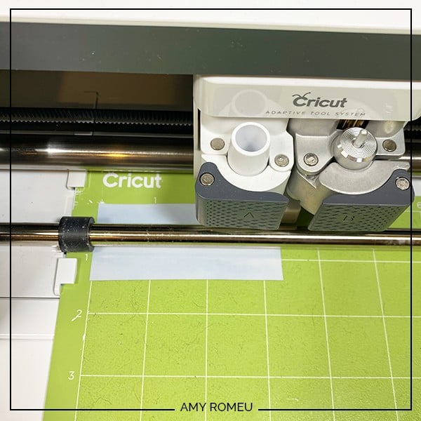 foil iron on on green cutting mat loaded into Cricut Maker