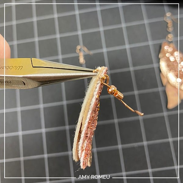 attaching earring hooks to faux leather earrings cut with a Cricut Joy