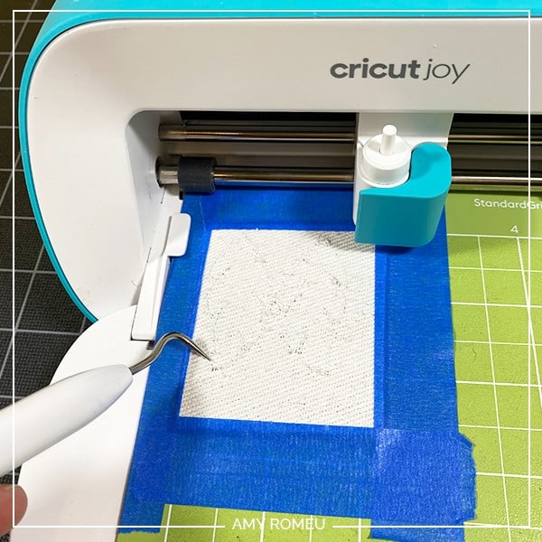 checking faux leather cut on the cricut joy with a sharp weeding tool