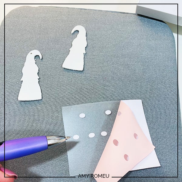 cutting and weeding heat transfer vinyl for gnome earrings