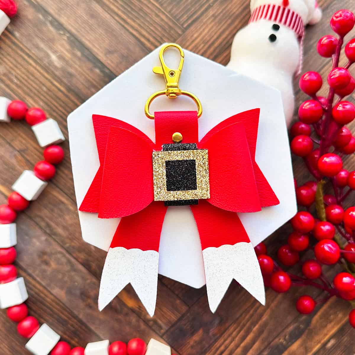 faux leather Santa bow purse charm made with a Cricut by Amy Romeu