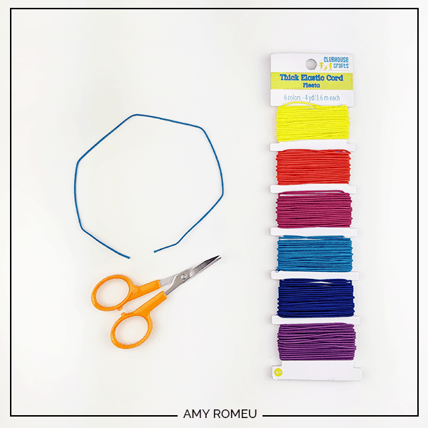 elastic cord and scissors for beaded bracelet tutorial