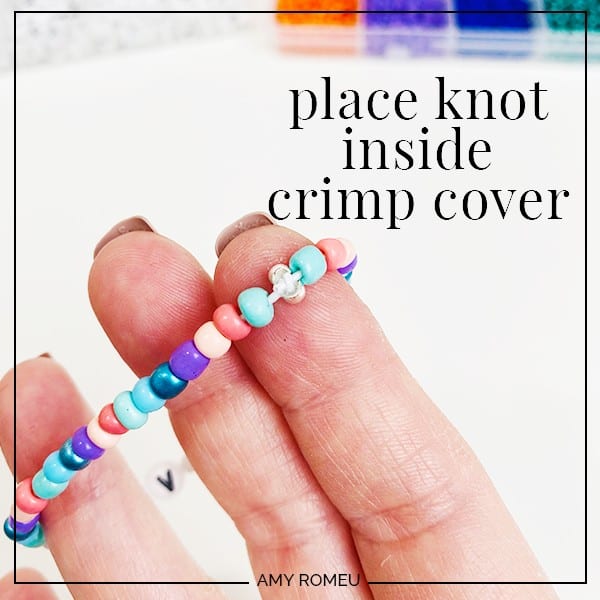 placing stretchy bracelet knot inside crimp cover