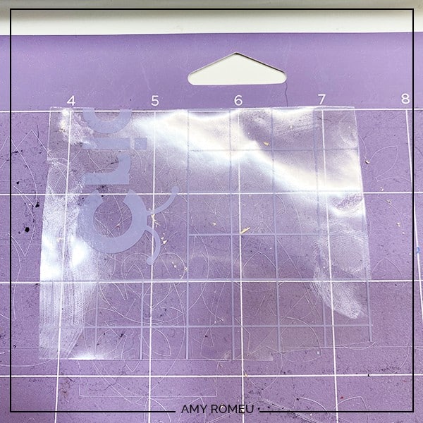 strong grip transfer tape on a purple Cricut cutting mat