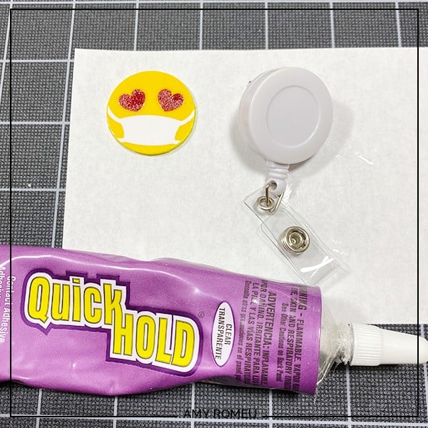 using quick hold glue to glue badge reel cover