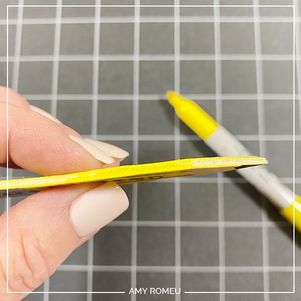 using Sharpie marker to color edges of pencil keychain